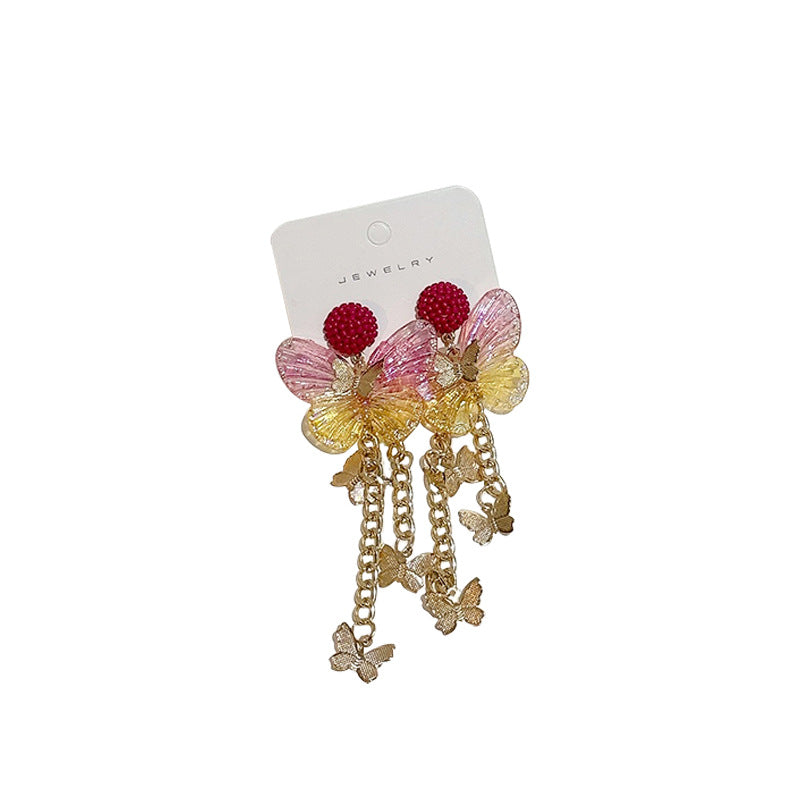 Pendientes de aleación de mariposa acrílica larga de borla larga al por mayor